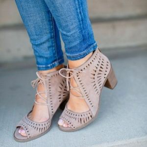 Lace up caged heels